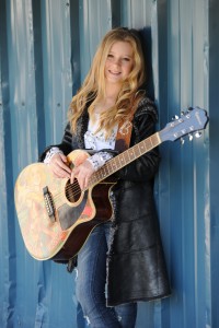 Emily Brooke poses for a portrait at the WIRK 107.9 FMÕs ÒRib Round-UpÓ held at the Cruzan Amphitheatre.